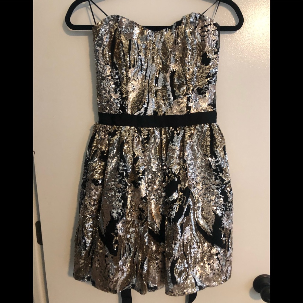 black, gold, and silver sequin strapless dress